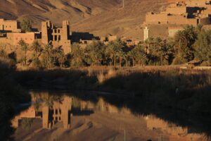Agdz town & palms reflected in Draa river